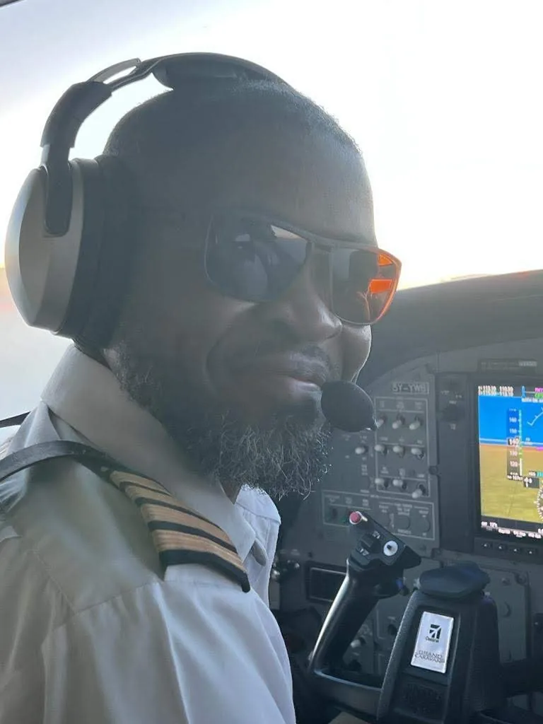 Randy Shiyukah on the flight deck, headset on