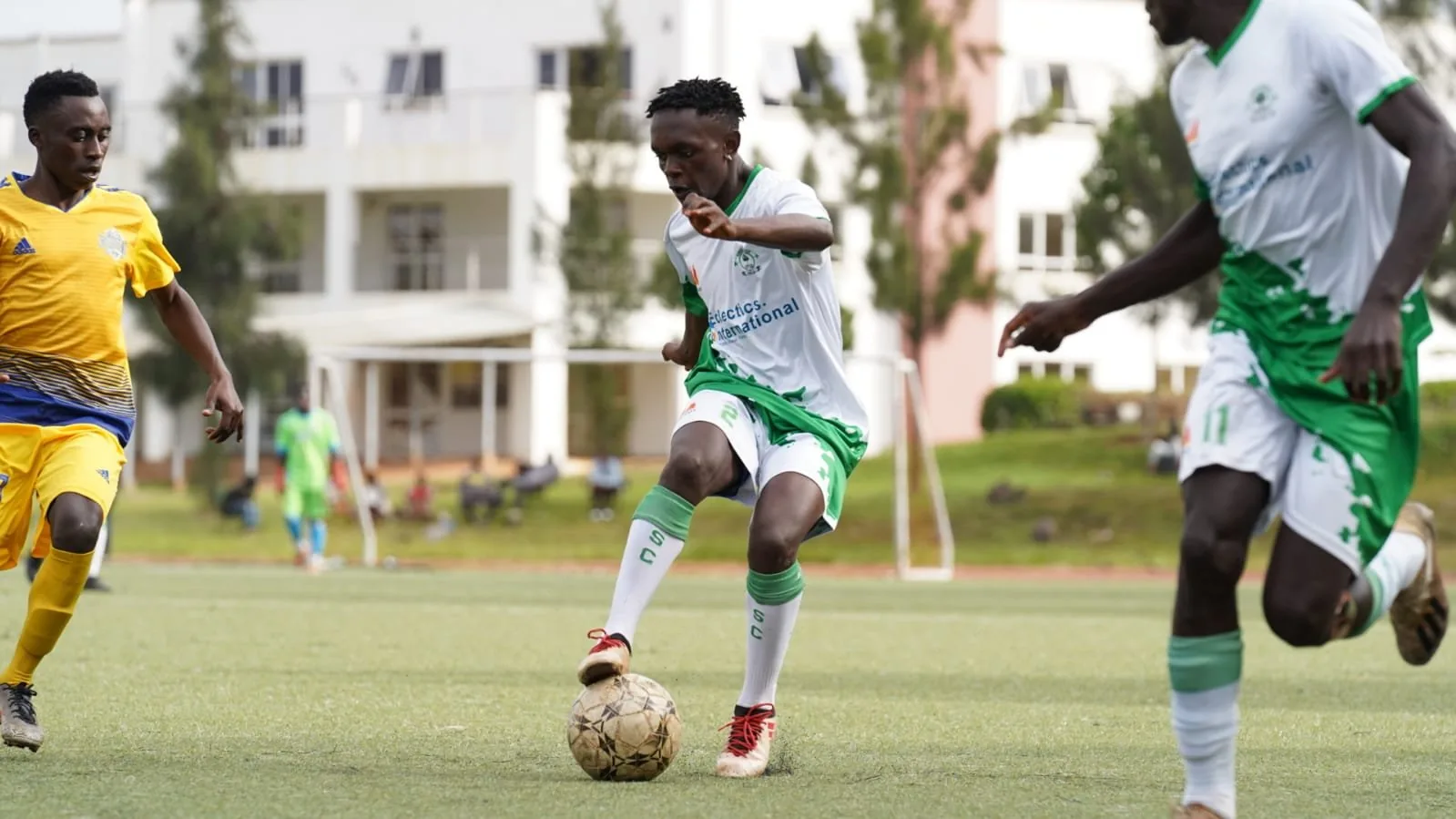 Kibra United: taking on a defender.