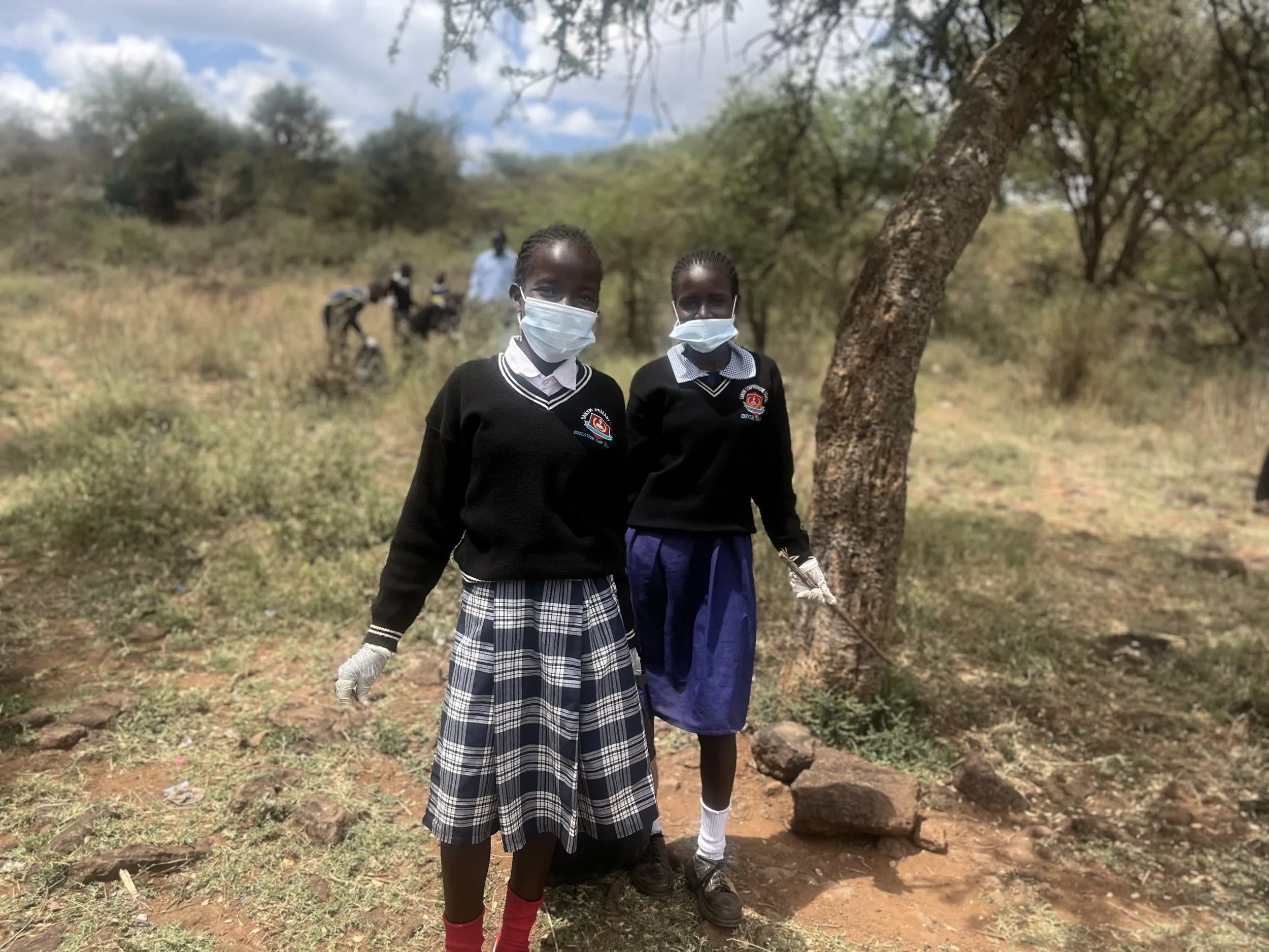 Saikeri clean-up: two pupils from saikeri school.