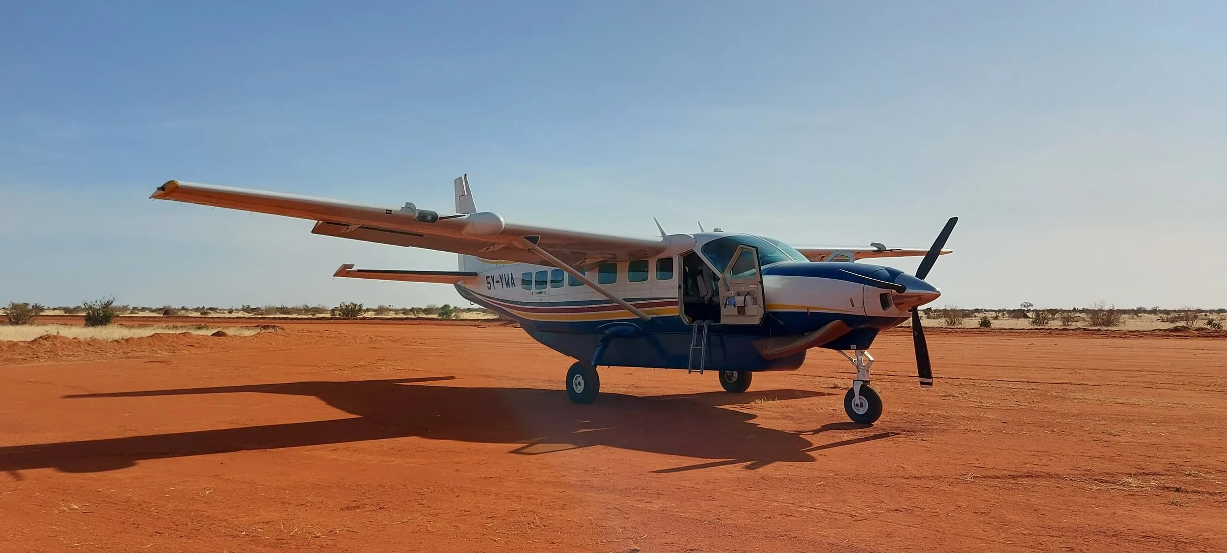 5Y-YWA on a remote strip with its cargo door open